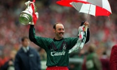 Bruce Grobbelaar celebrates winning the FA Cup with, by that time, the correct medal.