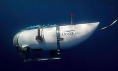 a white submersible under water