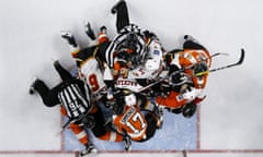 Referees try to break up a fight between the Philadelphia Flyers and the Calgary Flames during the third period of their NHL game at the Wells Fargo Center, Philadelphia.