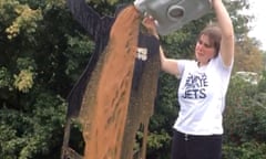 Climate activist Maddie Budd was shown in footage posted online pouring human waste onto the memorial for the late Captain Sir Tom Moore.