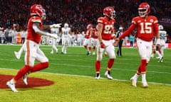Patrick Mahomes and his Chiefs teammates celebrate a first-half touchdown  against the Dolphins