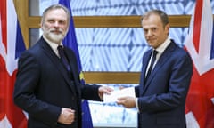 Separation … Britain’s EU ambassador, Tim Barrow, hands the UK’s article 50 letter to European council president Donald Tusk in Brussels on 29 March.