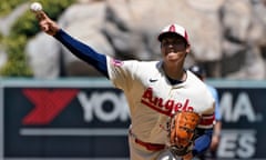 Angels starting pitcher Shohei Ohtani delivers a pitch during the second inning of Thursday afternoon’s game against the Reds.