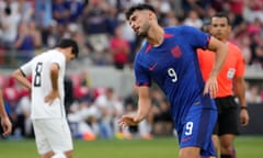 Ricardo Pepi, right, celebrates after scoring as Uzbekistan's Jamshid Iskanderov is seen in the background during the second half of Saturday’s friendly in St Paul, Minnesota.