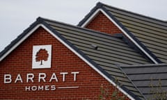A company logo is seen on the side of a house at a Barratt Homes housing development