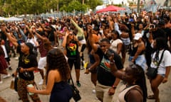 US-POLITICS-RACISM-HISTORY<br>People dance during the Leimert Park Rising Juneteenth celebration on June 19, 2021 in the Leimert Park neighborhood of Los Angeles, California. - The US on June 17 designated Juneteenth, which marks the end of slavery in the country, a federal holiday with President Joe Biden urging Americans "to learn from our history." (Photo by Patrick T. FALLON / AFP) (Photo by PATRICK T. FALLON/AFP via Getty Images)