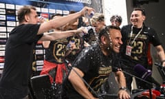 The head coach of Galatasaray, Okan Buruk, and his players celebrate their title triumph