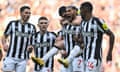 Newcastle celebrate their opening goal at Sunderland