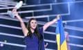 Jamala with trophy and Ukrainian flag