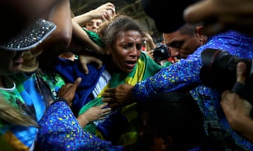 Rafaela Silva celebrates after winning Brazil’s first gold medal in the women’s 57kg judo.