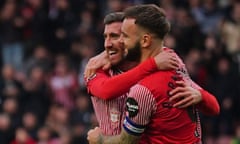 Southampton's Joe Rothwell (left) celebrates with Adam Armstrong after scoring his side’s fourth against Sunderland on 9 March 2024.