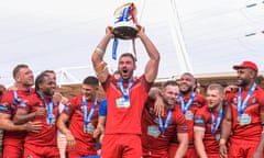 Captain Will Lovell lifts the Championship trophy after victory over Toulouse Olympique took the London Broncos back into the Super League.