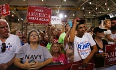 Supporters cheer as Donald Trump speaks to a large group at an airport hanger Tuesday in Melbourne, Florida.