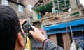 Earthquake hits Indian Kashmir<br>epa05252586 A Kashmiri man captures pictures with his mobile phone of a house damaged by an earthquake in Srinagar, the summer capital of Indian Kashmir, 10 April 2016. A 6.6 magnitude earthquake jolted Indian Kashmir in the afternoon forcing people out of their homes, however, there was no immediate report of loss of lives.  EPA/FAROOQ KHAN