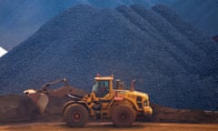 Iron ore is loaded at a port