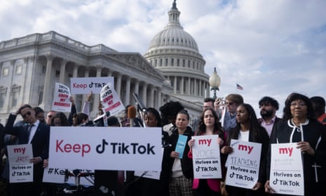 People gather for a press conference about their opposition to a TikTok ban on Capitol Hill in Washington, DC on 22 March 2023.