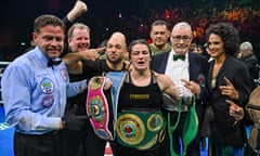 Katie Taylor with her belts after the fight.