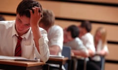 School pupils in exam conditions in a school hall<br>A36PMP School pupils in exam conditions in a school hall