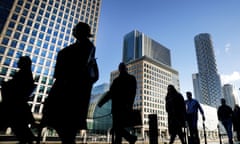 Commuters walking through Canary Wharf in London