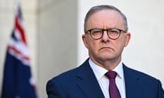 Anthony Albanese with Australian flag in background