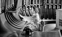 a woman uses a pneumatic tube system