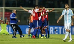 Paraguay’s players celebrate after defeating Argentina in Cordoba.