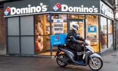 delivery rider outside Domino's