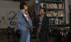 This image released by Netflix shows Amandla Stenberg, left, and Andre Holland in a scene from “The Eddy.” The musical drama series is a collaboration between “La La Land” director Damien Chazelle and six-time Grammy Award winner Glen Ballard. (Lou Faulon/Netflix via AP)