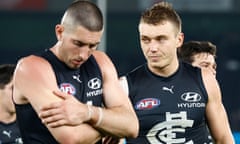 Carlton’s Jacob Weitering and Patrick Cripps look dejected after their round nine loss to the Western Bulldogs at Marvel Stadium.