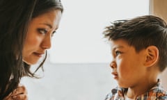 A little boy talking to his mother (posed by models)