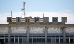 A view shows the abandoned Nicosia International Airport near Nicosia March 10, 2014. Greek and Turkish Cypriots have lived estranged for decades. A power-sharing government crumbled soon after independence from Britain in 1960 and the island has been divided since a Greek Cypriot coup was followed by a Turkish invasion of the north in 1974. Four decades on, a United Nations-controlled buffer zone splits Cyprus east to west, with Cyprus's ethnic Greeks living in the south, and its Turks in the north. The buffer zone still contains crumbling relics of times gone by - abandoned houses, businesses and even an airport. Picture taken March 10, 2014. REUTERS/Neil Hall (CYPRUS - Tags: POLITICS SOCIETY TRANSPORT)
 
 ATTENTION EDITORS: PICTURE 02 OF 40 FOR PACKAGE 'FROZEN IN TIME - THE CYPRUS BUFFER ZONE'
 TO FIND ALL IMAGES SEARCH 'NICOSIA FROZEN'