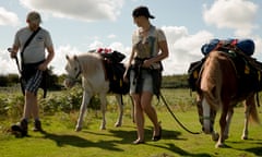 Pack pony-trekking near Powys.