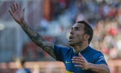 Boca Juniors' forward Carlos Tevez celebrates after scoring against Argentinos Juniors during their Argentina First Division football match at the Diego Armando Maradona stadium in Buenos Aires, on September 19, 2015.   AFP PHOTO / ALEJANDRO PAGNIALEJANDRO PAGNI/AFP/Getty Images