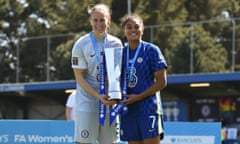 Ann-Katrin Berger (left) and Jess Carter at Kingsmeadow, south-west London, after their team, Chelsea, won the league.