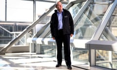 Rupert Serco standing in an office building