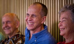 Al-Jazeera journalist Peter Greste (C) smiles next to his parents Lois (R) and  Juris (L)