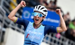 Lizzie Deignan celebrates as she crosses the finish line.