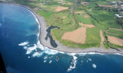 LA REUNION-SEARCH FOR MH370 DEBRIS-CONTINUE<br>10 Aug 2015 --- (150809) -- LA REUNION, Aug. 9, 2015 (Xinhua) -- Aerial Photo taken on Aug. 9, 2015 shows the eastern coast of France’s overseas island La Reunion in the Indian Ocean. France on Aug. 7 announced that hunts for more MH370 debris will continue for at least a week off la Reunion after a wing section was spotted near the island. (Xinhua/Zhang Chuanshi) --- Image by © Zhang Chuanshi/Xinhua Press/Corbis