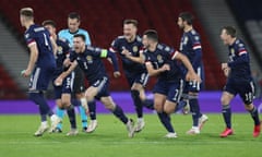 Euro 2020 Qualification Play off - Scotland v Israel<br>Soccer Football - Euro 2020 Qualification Play off - Scotland v Israel - Hampden Park, Glasgow, Scotland, Britain - October 8, 2020 Scotland’s Andy Robertson and teammates celebrate at the end of the match after winning the penalty shoot out REUTERS/Russell Cheyne