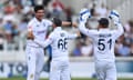 Josh Tongue of England celebrates with Joe Root and Jonathan Bairstow after dismissing Fionn Hand of Ireland to take his five wicket haul.