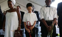 New Orleans Marks 10th Anniversary Of Hurricane Katrina<br>NEW ORLEANS, LA - AUGUST 29: Aaron Covin (C) bows his head in prayer at the start of a 10th anniversary event to remember Hurricane Katrina at the New Orleans Katrina Memorial where the remains of hurricane victims who were either unidentified or unclaimed are held in mausoleums on August 29, 2015 in New Orleans, Louisiana. Hurricane Katrina killed 1836 people and is considered the costliest natural disaster in U.S. history. (Photo by Joe Raedle/Getty Images)