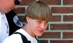 File photo of police leading suspected shooter Dylann Roof into the courthouse in Shelby, North Carolina<br>FILE PHOTO: Police lead suspected shooter Dylann Roof into the courthouse in Shelby, North Carolina, U.S. June 18, 2015.  REUTERS/Jason Miczek/File Photo