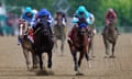 National Treasure, with jockey John Velazquez, front right, edges out Blazing Sevens, with jockey Irad Ortiz Jr, second from left, to win the148th running of the Preakness Stakes on Saturday in Baltimore.