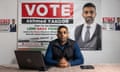 Akhmed Yakoob sitting at desk with laptop