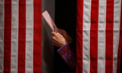 A voter checks her ballot in the "Ballot Room" of the Balsams Hotel in Dixville Notch, New Hampshire January 9, 2012. Since 1960, Dixville Notch voters have agreed to turn out every four years to meet the many candidates that come seeking their vote, as well as arriving at the polling place just before midnight on primary day. REUTERS/Jessica Rinaldi (UNITED STATES - Tags: POLITICS ELECTIONS TPX IMAGES OF THE DAY)