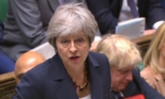 Theresa May speaks during Prime Minister’s Questions on 9 May. Boris Johnson listens on.