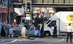 Forensic officers examine the van driven by Darren Osborne that killed Makram Ali ourtside Finsbury Park mosque in 2017.