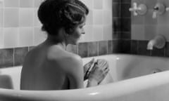 1920s 1930s woman sitting in bath tub<br>13 Oct 1930 --- 1920s 1930s woman sitting in bath tub --- Image by © ClassicStock/Corbis