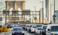 Traffic enters lower Manhattan after crossing the Brooklyn Bridge