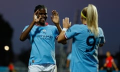 Khadija ‘Bunny’ Shaw celebrates with Chloe Kelly after scoring her second goal in Madrid.